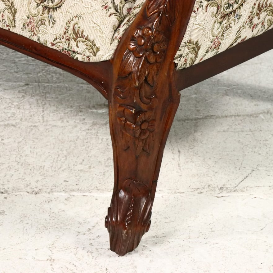 Victorian Style Carved Loveseat with Scrolling Foliate Motif