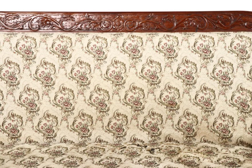 Victorian Style Carved Loveseat with Scrolling Foliate Motif