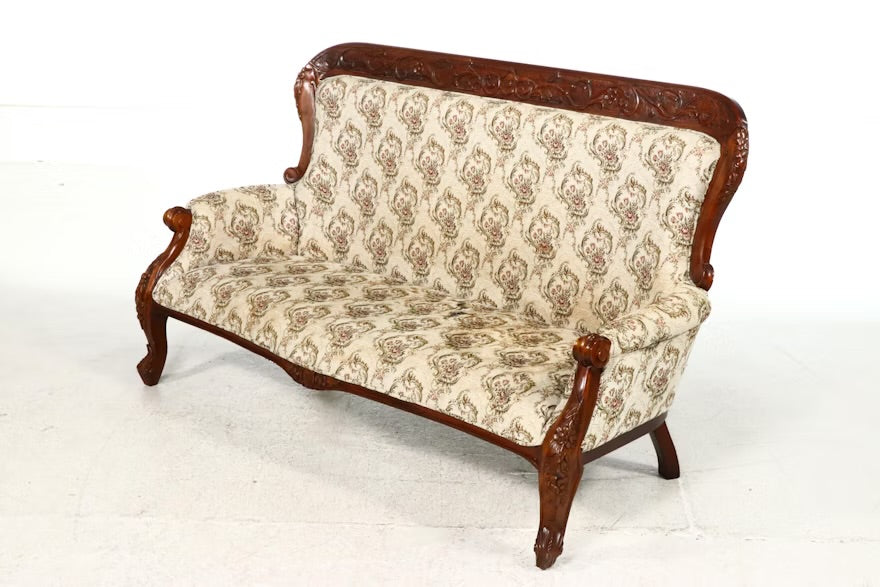 Victorian Style Carved Loveseat with Scrolling Foliate Motif