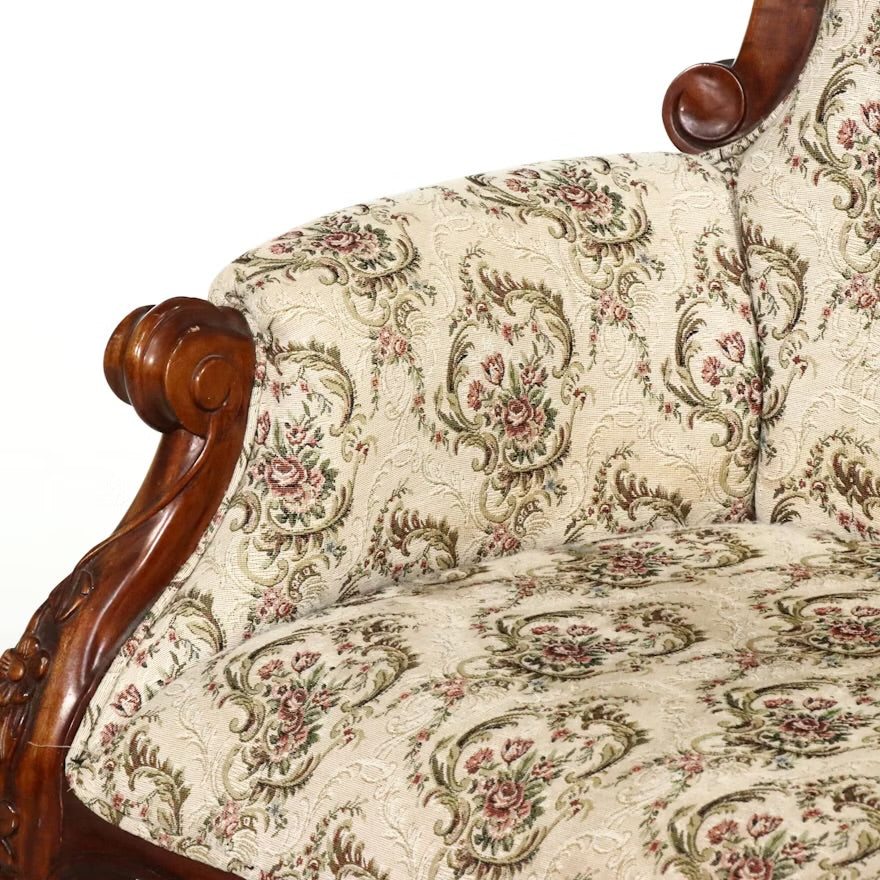 Victorian Style Carved Loveseat with Scrolling Foliate Motif