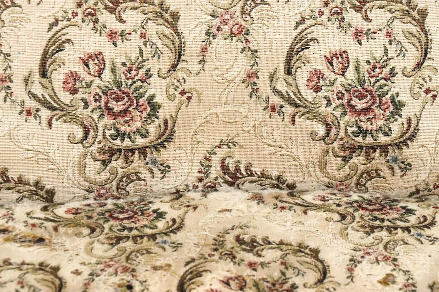 Victorian Style Carved Loveseat with Scrolling Foliate Motif