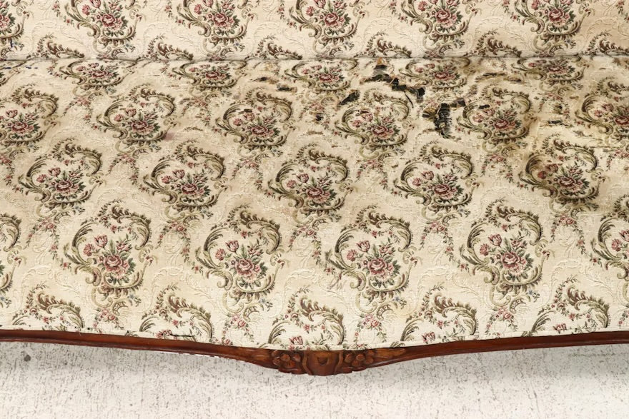 Victorian Style Carved Loveseat with Scrolling Foliate Motif