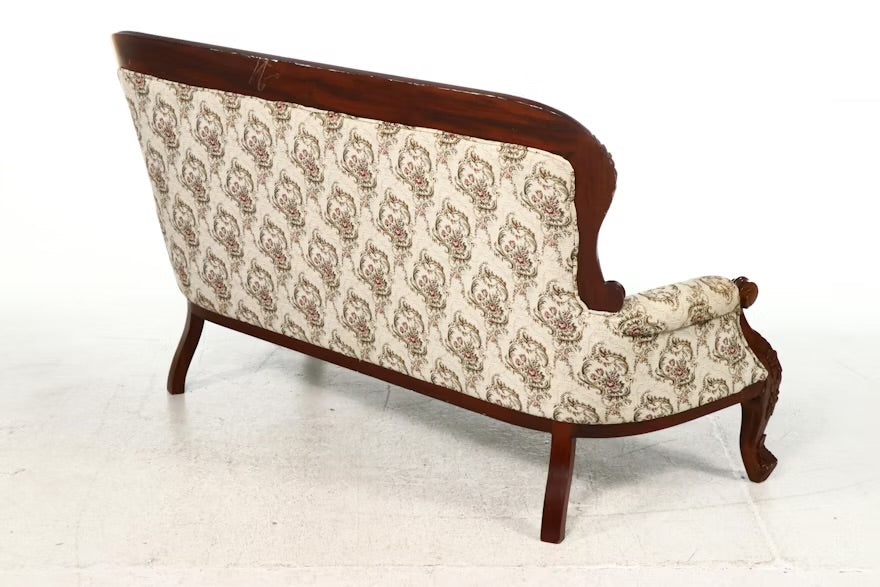 Victorian Style Carved Loveseat with Scrolling Foliate Motif