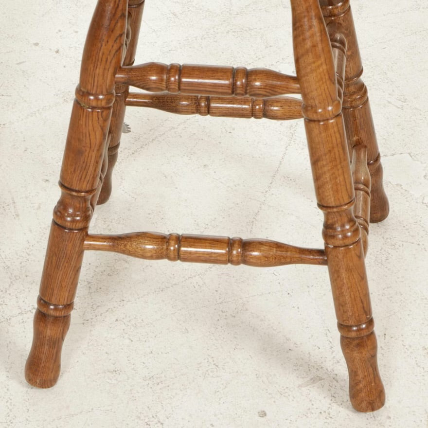Three Victorian Style Oak Press-Back Swivel Barstools