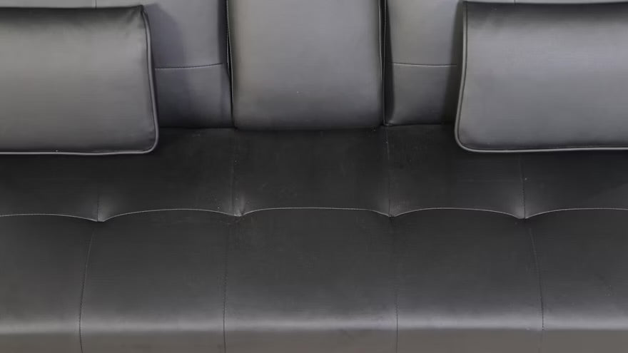 Modern Black Vinyl Upholstered Futon with Center Beverage Console